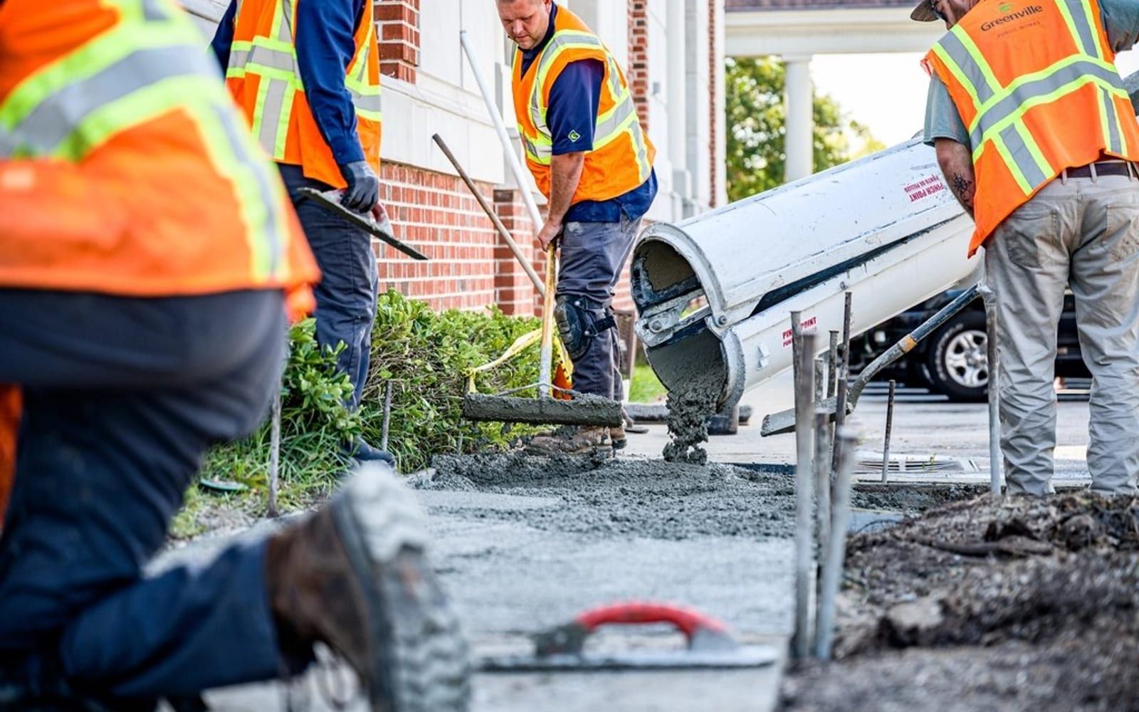 A concrete crew working a pour on a residential site